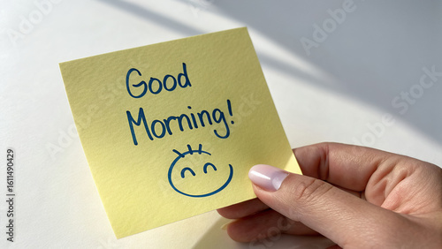 “Good Bye” Handwritten Sticky Note with Smiley and Heart – Farewell Message on Laptop Touchpad