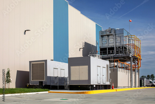 refrigeration system and two electric power generators in exterior of cold storage warehouse