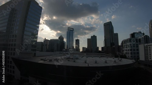 Charlotte, North Carolina, USA, June 23, 2025: TIMELAPSE - Uptown Charlotte at sunset, also called Center City, is the central business district of Charlotte.