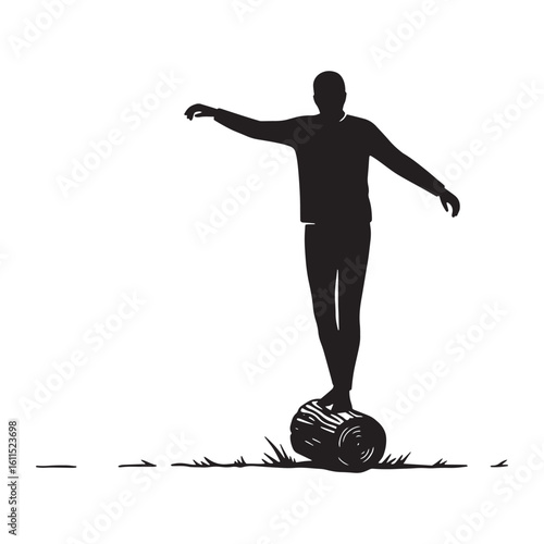 Silhouette of a man balancing on a log with arms extended for equilibrium