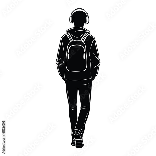 Young man with backpack and headphones walking away in silhouette