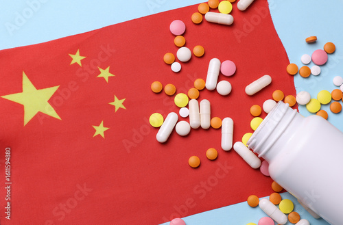 Canvas Print China flag and pills. Concept of health care