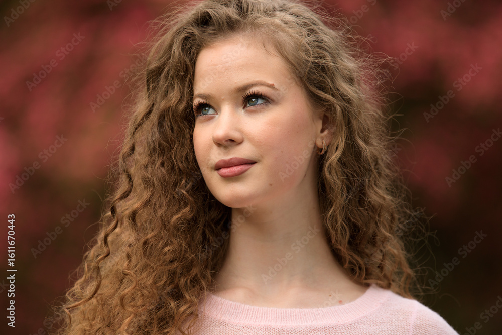 Portrait of beautiful young girl in park in spring Portrait of beautiful young girl in park in spring
