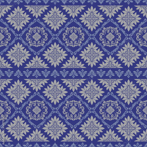 Damask richly detailed seamless pattern, feat. ornate floral and scroll motifs with full coverage. Ideal for high-end wallpaper, luxury packaging, fabric design, elegant digital backgrounds.