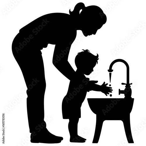 Silhouette of mother and child washing hands