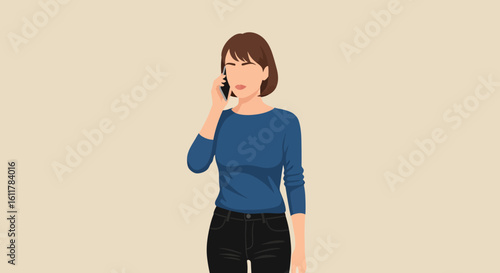Faceless woman in blue shirt and black jeans talking on a smartphone.