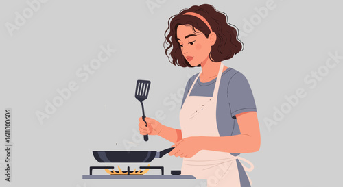 Woman with Curly Hair Cooking with Spatula and Pan on Gas Stove.