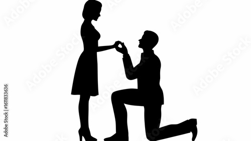 Silhouette of a man proposing to a woman with a ring in his hand in a romantic black and white image