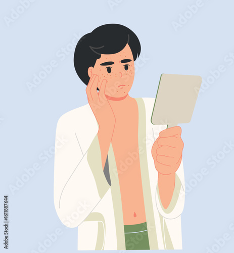 A man in a bathrobe is looking at herself in the mirror with anxiety.