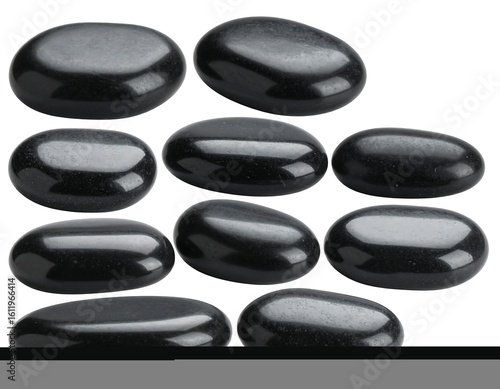 Smooth black stones arranged