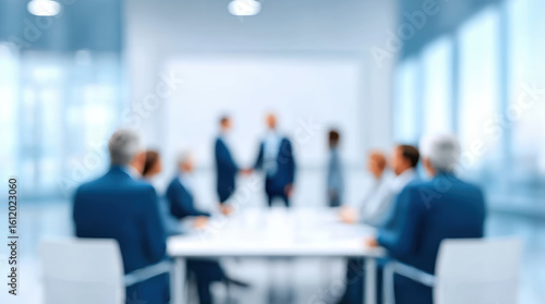Professional business meeting in modern corporate boardroom with executives in suits discussing strategy around conference table. Blurred office environment with glass windows and formal atmosphere