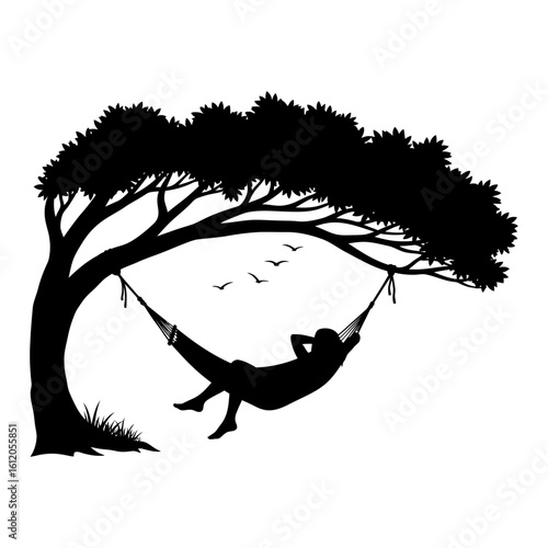 Silhouette of person relaxing in a hammock suspended from a tree with birds flying above them