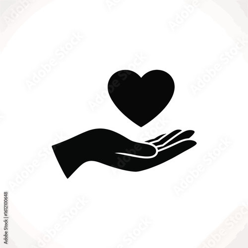 Black heart held by open hand care love
