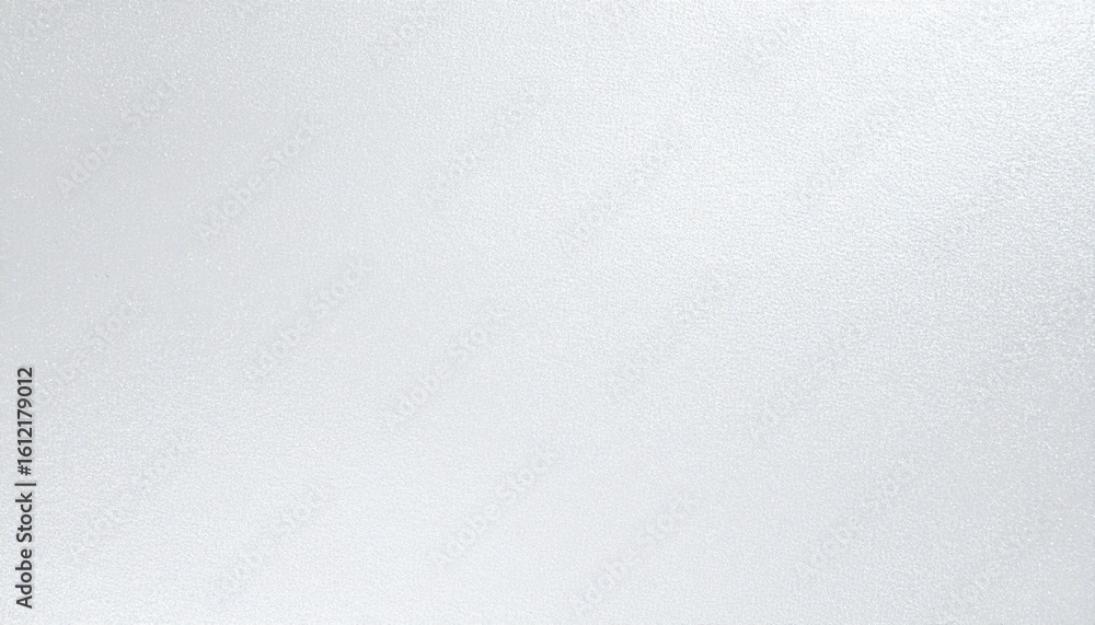 Fototapeta premium Soft, neutral backdrop featuring an untextured light gray surface with mild tonal variation, designed to evoke minimalism, calm, and spatial clarity. Ideal for showcasing product silhouettes or abstra