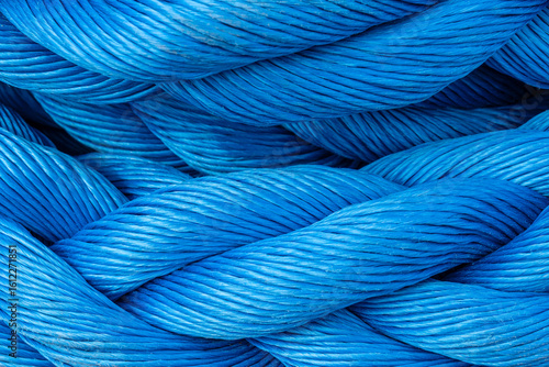 A nylon marine rope is shown in close-up as part of ship equipment. This material maritime