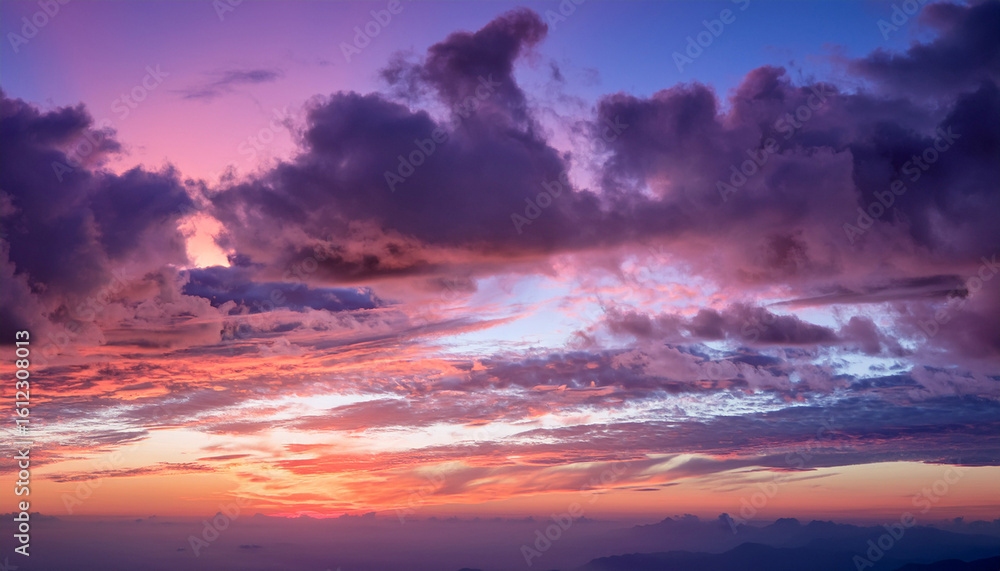 beautiful sunset over soft clouds in pastel shades of pink and purple lighting up the sky at dusk beautiful sunset over soft clouds in pastel shades of pink and purple lighting up the sky at dusk