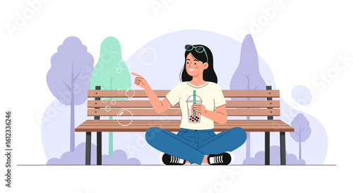 Girl Enjoying Bubble Tea While Relaxing on Park Bench, Summer Day Out