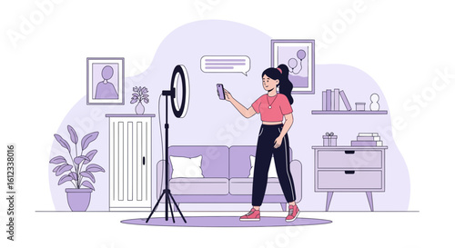 Female Blogger Recording a Video Using a Ring Light in Her Home Studio