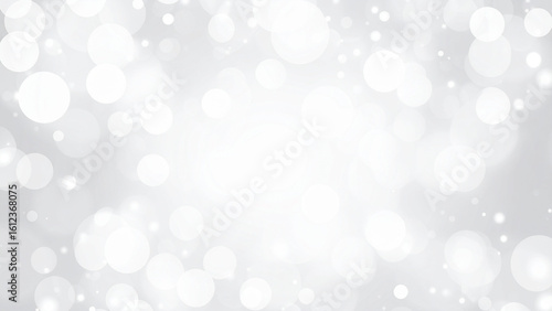 White abstract background with bokeh defocused lights.