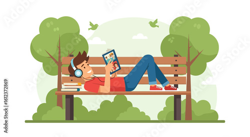Man reading book and listening to music on park bench enjoying nature