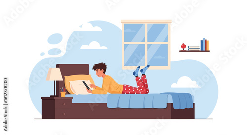 Relaxed Man In Pajamas Is Lying In Bed And Using A Tablet Indoors