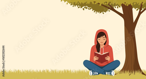 Young Woman Enjoying Reading A Book Under A Tree In Peaceful Nature