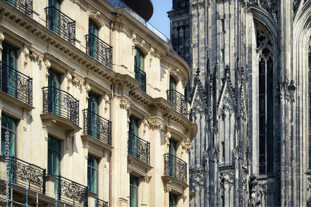 Obraz premium Renovated façade of one of Europe's oldest grand hotels, the Dom Hotel, in the shadow of Cologne Cathedral in July 2025
