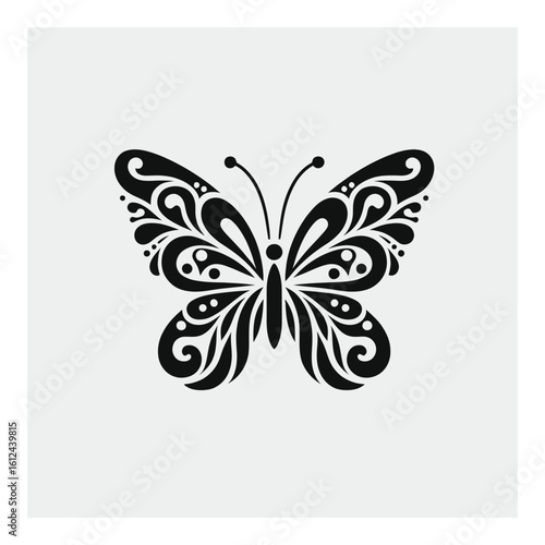 Vector art of an elegant black butterfly silhouette with ornate, swirling wing patterns on a light gray background