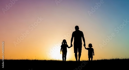 Silhouette of Father and Two Children Walking Hand in Hand at Sunset