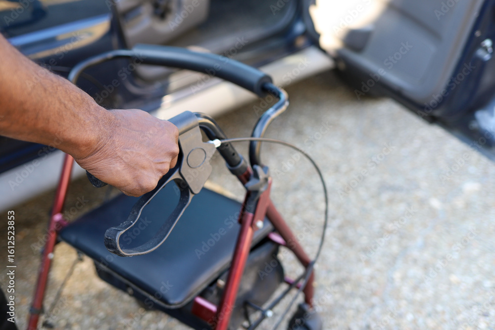 Obraz premium A black man using a walker to walk