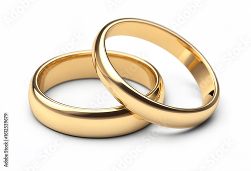 golden wedding rings on white background