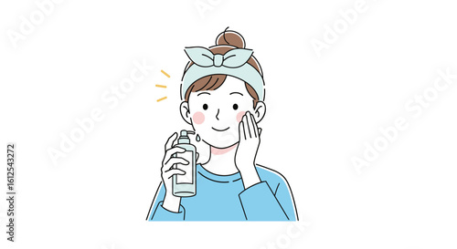 Young woman applying a facial mist from a bottle to her clean and refreshed skin with a gentle touch demonstrating a skincare routine for healthy glowing complexion