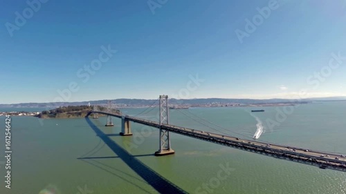 Wallpaper Mural A long bridge spans across the bay on a clear day Torontodigital.ca