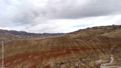 Painted hills of oregon under a cloudy sky in a scenic landscape