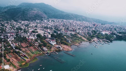 Santiago Atitlan, Guatemala, Drone Shot of Town and Port on Lake Atitlan on Misty Morning