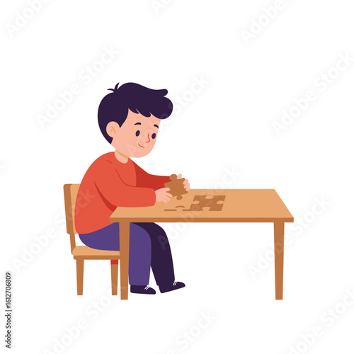 Boy Concentrating on Completing a Jigsaw Puzzle at a Table