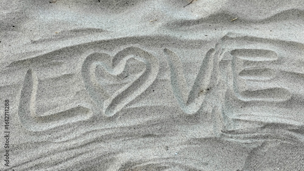 Foto Write love on the sand