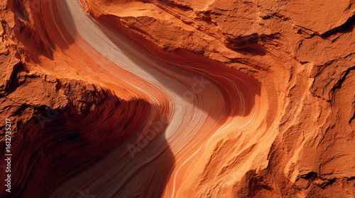 Abstract Aerial View of Red Sandstone Formations with Wave Patterns