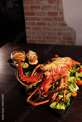 Grilled Lobster Served on Fresh Salad with Gourmet Sides