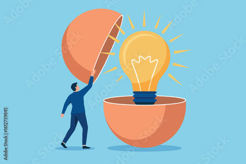 Man opening a sphere to reveal a light bulb inside, symbolizing idea generation and innovation concept