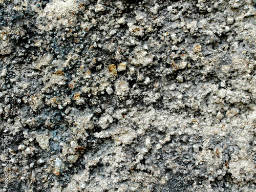 The walls made of cement are not smoothed so they display an interesting texture to be used as a background.