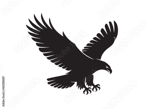 Black silhouette of an eagle with wings spread descending bird white
