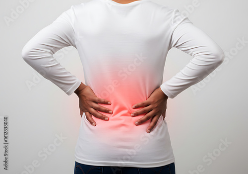 Wallpaper Mural Person Holding Lower Back in Pain – Backache, Muscle Strain, Spine or Kidney Discomfort Concept Torontodigital.ca