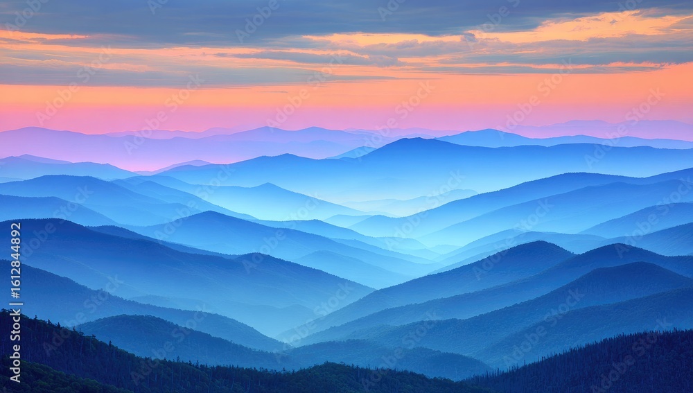 Fototapeta premium Misty mountain range at dawn