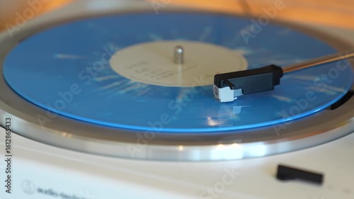 turntable with vinyl record. playing music
