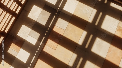 Sunlight stripes on textured tiled floor shadow