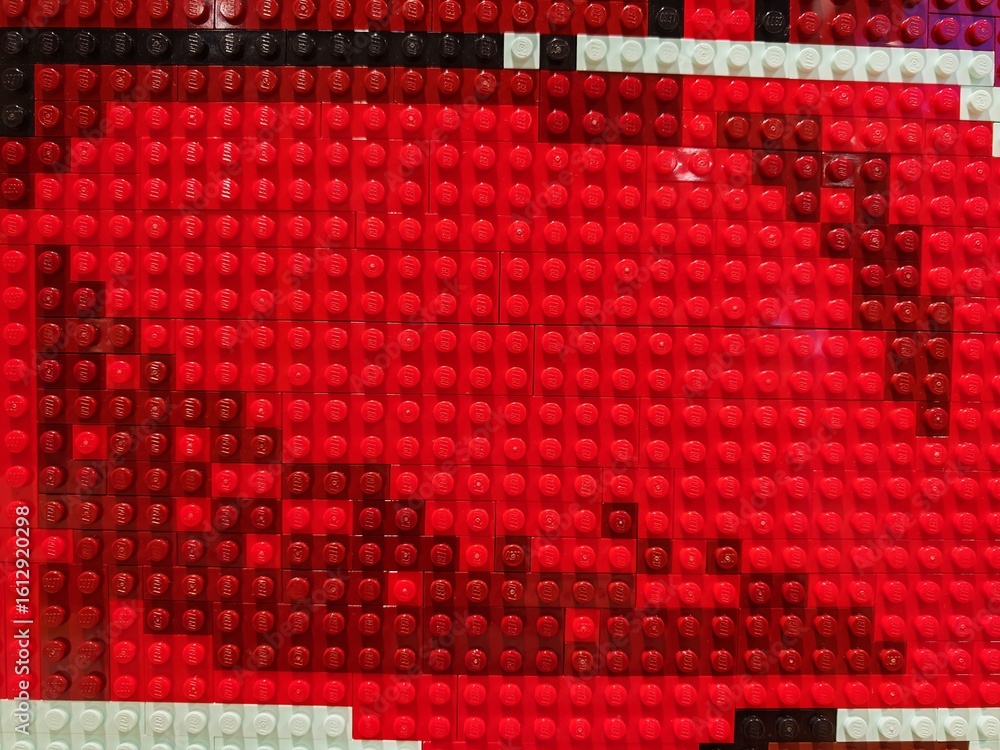 Obraz premium Jul 28, 2025 - Hong Kong, China: Red Lego bricks form a large heart in a Hong Kong shopping mall shop display.