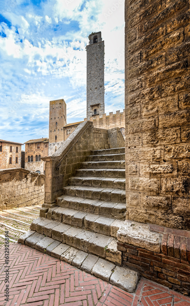 Fototapeta premium Stairs leading to a tower in San Gimignano, Italy