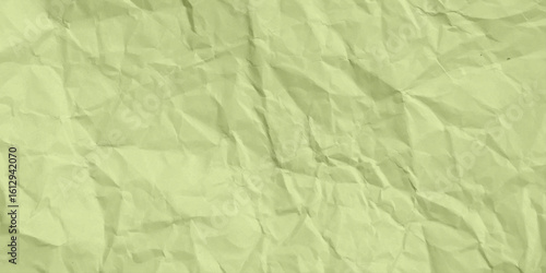 Abstract background of crumpled green paper stock photo