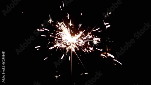 The stunning visuals of igniting lights in the darkness symbolize celebration and endless joy that captivates
